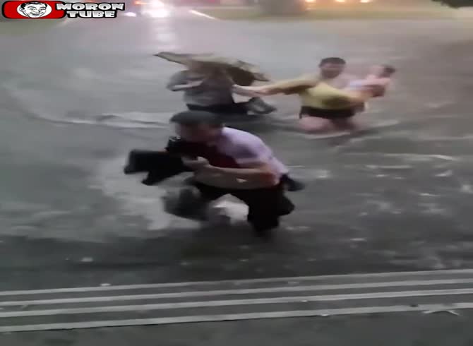 Video :As a huge storm and flash flood overrun a Russian village, a woman gets hit by lightning